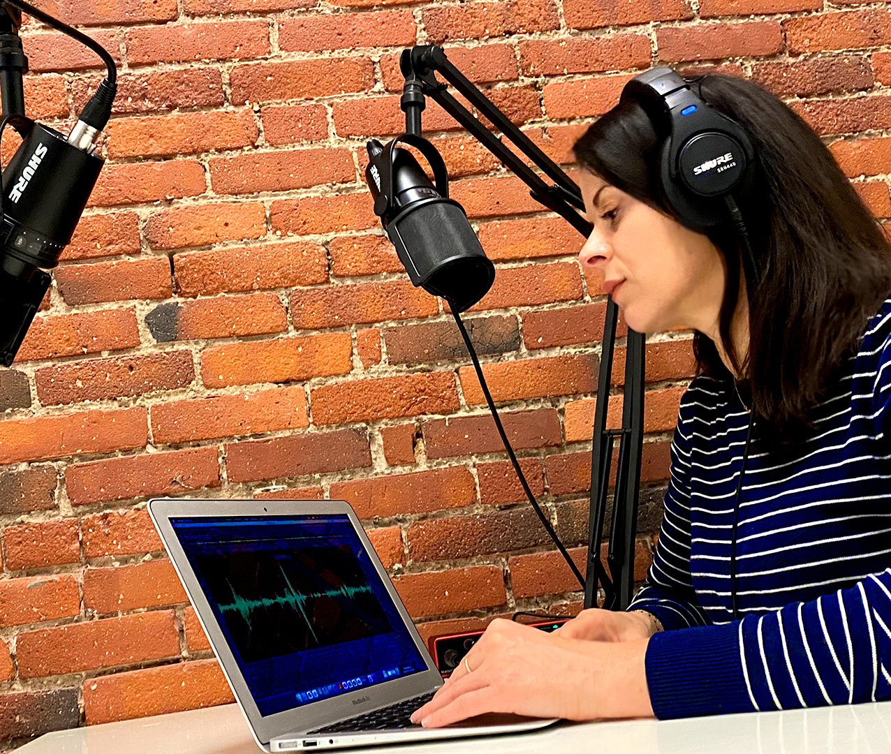 Designers at creative agency recording voiceover for a renewable energy company